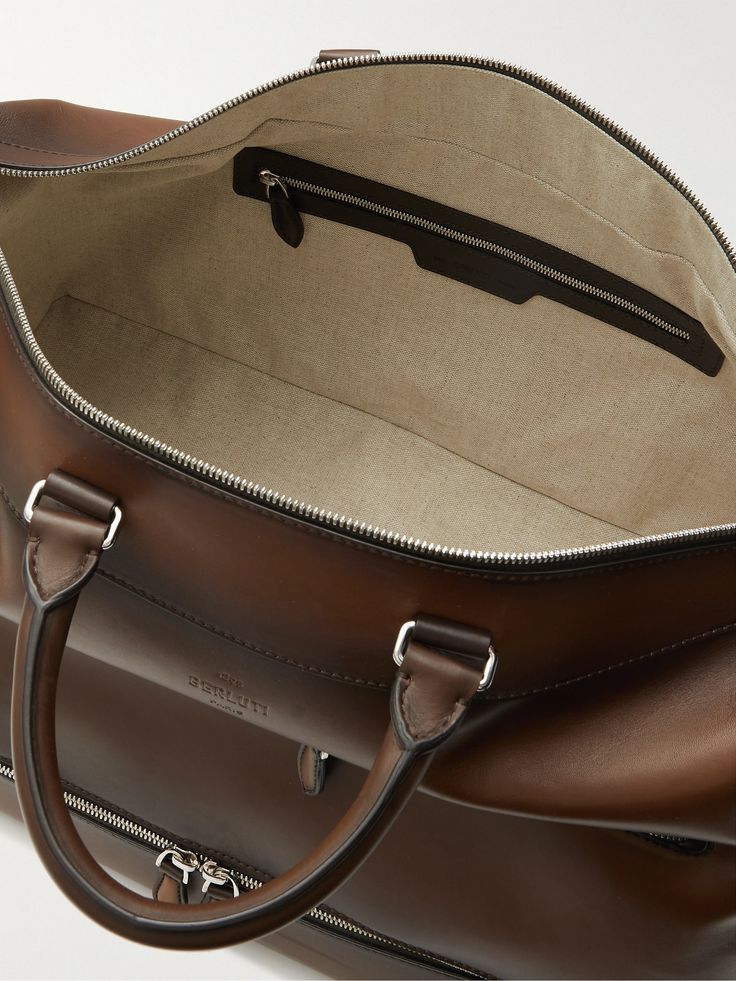 Berluti's bag has been expertly crafted in France from premium Venezia leather that will develop a unique patina over time. Designed with both top handles and a detachable shoulder strap, it's sized to hold everything you need for a weekend away and features a zipped compartment at the base to keep shoes separate from your clothes. Berluti Bag, Recording Device, Leather Inspiration, Leather Holdall, Travel Noire, Holdall Bag, Audio Recording, Digital Audio, Fine Jewelry Designers