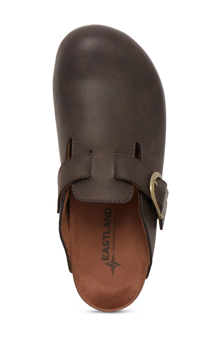 A roomy round toebox and adjustable buckle strap create a custom, comfortable fit on a classic mule created with a comfort, moisture control insole. Slip-on Cork contoured cushioned footbed Manmade upper and sole Imported Comfortable Outdoor Clogs With Buckle Closure, Adjustable Slip-on Clogs With Cushioned Footbed, Adjustable Cushioned Slip-on Clogs, Comfortable Synthetic Clogs With Buckle Closure, Comfortable Synthetic Mules With Buckle Closure, Adjustable Cushioned Clogs With Round Toe, Adjustable Round Toe Clogs With Cushioned Footbed, Adjustable Clogs With Cushioned Footbed And Round Toe, Classic Mules With Buckle Closure And Round Toe