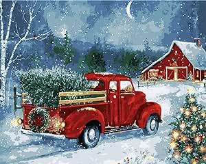 an old red truck with a christmas tree in the bed is parked on a snowy road