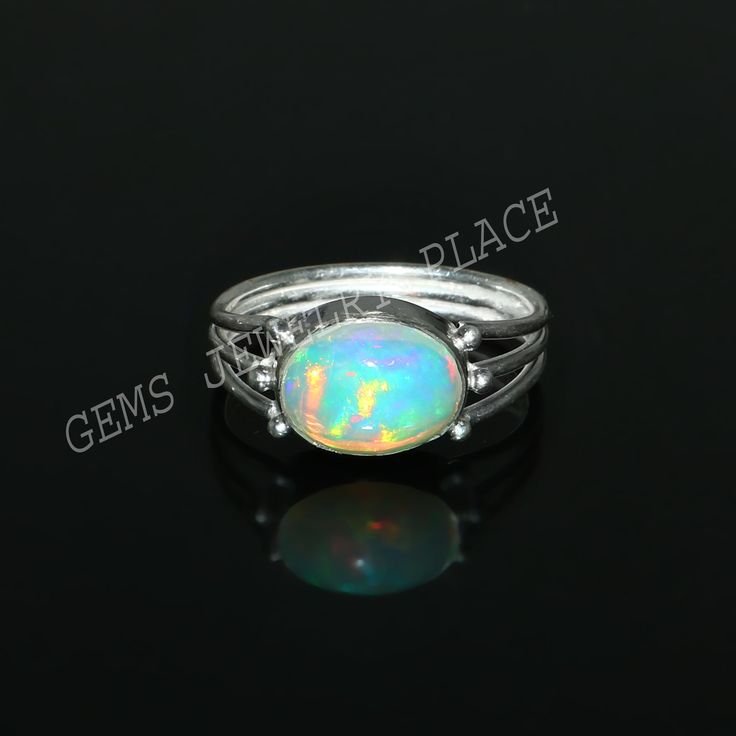 100% Natural Ethiopian Fire Opal Gemstone Ring Jewelry  Item-Ring Gemstone-Ethiopian Opal Color-Multi Color Weight-12.06CT Type-Handmade Size-All Size Available tell us Your Required Size We Will Make According to Your requirements! Metal-Sterling Silver Metal Purity-925 Parts Per 1000 Are Ethiopian opals good luck? While some people believe it is unlucky for people not born in October to wear opal, the gemstone has actually long been valued as a stone of luck and magic--as well as love and passion. Ethiopian opal is believed to be an emotional intensifier, enhancing the true nature of those who wear it. For more Attractive jewelry Visit on- https://www.etsy.com/shop/GemsJewelryPlace?ref=seller-platform-mcnav Happy Shopping! Opal Jewelry Ring, Unique Opal Ring, October Birthstone Ring, Affordable Rings, Blue Opal Ring, October Birthstone Rings, Ring Opal, Fire Opal Ring, Natural Gemstone Ring