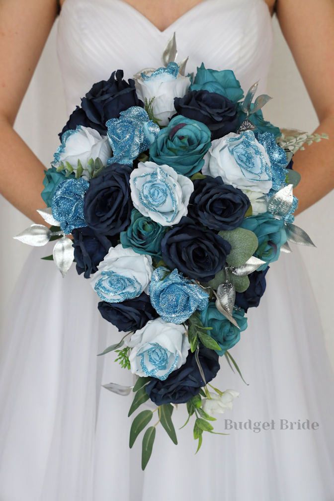 a bridal holding a bouquet of blue and white flowers