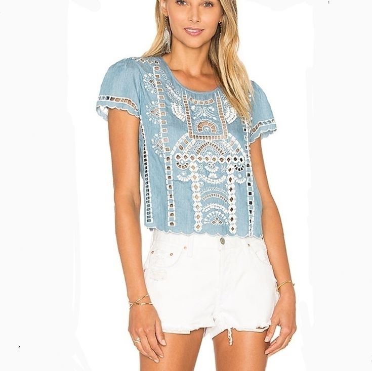 Stunning Beaded Crop Top By Lovers+Friends Brand New- With Brand Tag Equipped With Extra Rhinestones And Beads Embroidered Eyelet Easy Pull-On Laser Cut Details Ruffle Effect Pair With White Flowy Skirt, Shorts, Jeans Or Black Slacks Color: Light Blue Chambray Fabrication: 100% Lyocell Measurements: Chest=34" Length =19" Feel Free To Contact Me With Any Questions Prior To Purchase Thank You! Kostkutter