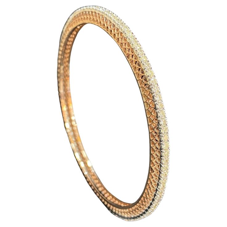 This exquisite bangle is truly special, featuring 3.58 carats of round natural diamonds set in a 14K rose gold eternity design. It’s sure to bring out a million-dollar smile and make you feel like royalty! Specifications : Diamond Weight : 3.58 Carats Diamond Shape : Round Diamond Color Grade : F Diamond Clarity Grade : VS1 Gold Color : Rose Gold Gold Purity : 14K Width : 4.25mm SKU : B-575 Our Promise : 1.) HIGH Quality Products. 2.) All our products are accomanpied with Hallmark Stamps and Cer Diamond Bangle In Rose Gold With Pave Setting, Rose Gold Diamond Bangle With Pave Setting, Rose Gold Bangle With Single Cut Diamonds, Diamond White Bangle With Pave Setting, White Round Bangle With Pave Setting, Rose Gold Brilliant Cut Bangle For Weddings, Wedding Rose Gold Bangle With Brilliant Cut, Wedding Rose Gold Brilliant Cut Bangle, Rose Gold Diamond Bracelet With Pave Setting For Wedding