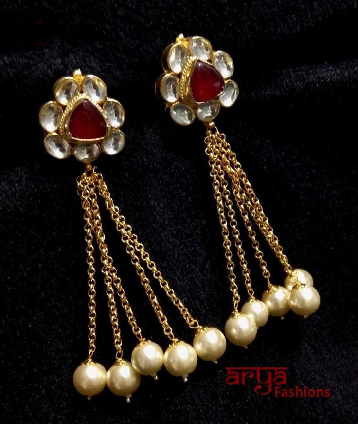 Red Kundan Jhumka/Indian Earrings/Kundan Earrings/Golden Jhumka Earrings/Indian Wedding Jewelry/Bollywood earrings/Indian Wedding Jewelry Features: Handmade Jewelry Made in Brass with high quality Kundan Stones and pearl beads 22k gold plated jewelry Length: 3 Inches Comes with push back closure Red Drop Earrings Danglers For Wedding, Red Drop Danglers For Wedding, Red Jhumkas With Latkans For Puja, Red Latkans Jhumkas For Puja, Red Jhumkas For Wedding And Diwali, Red Bridal Earrings For Celebration, Red Kundan Jhumkas With Latkans, Red Drop Jhumkas For Party, Red Dangling Jhumkas For Party