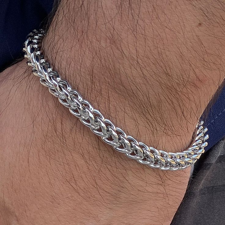 Men's franco chain hip hop bracelet. Measures 9" inch long x 6MM thick. Stainless Steel - stamped on clasp. Real solid stainless steel jewelry. Solid weight at approx. 32 grams. Stylish bayonet locking snap clasp. Won't fade or turn your skin green. Super shiny bracelet is very well made. 100% FREE SHIPPING in USA. Order now! Mens Bracelet Silver Chains, Metal Cuban Link Bracelet With Solid Construction, Stainless Steel Cuban Link Bracelet With Curb Chain, Cuban Link Bracelet With Curb Chain In Metal, Metal Cuban Link Bracelet With Curb Chain, Cuban Link Chain Bracelet With Stainless Steel Clasp, Adjustable Cuban Link Bracelet With Box Chain, Adjustable Cuban Link Chain Bracelet, Stainless Steel Cuban Link Bracelets