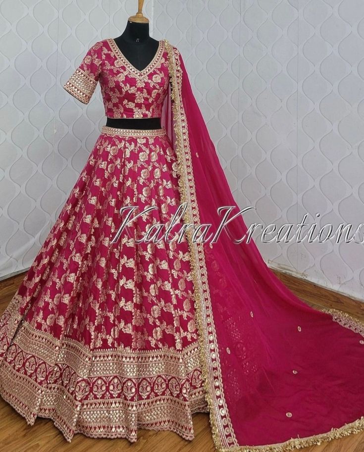 Made to Order/Measurement/Custom Order Lehenga - Color : Rani pink  - Fabric : Pure Banarasi Silk - Fully flared paneled lehenga -   Pure Banarasi meenakari Silk - Drawstring closure with Tassels - - It can be customize in any design or size  PLEASE NOTE: BUYERS ARE RESPONSIBLE FOR ANY CUSTOMS AND IMPORT TAXES THAT MAY APPLY. This is a made to order product. If you opt for 'Made To Measurement Option', we will provide a measurement template and you can share the measurements likewise. If you want to opt for 'Standard Size', Please refer to the size chart provided in the listing. Shipping: Standard Shipping is done by DHL ecommerce and it mostly takes 2 to 3 weeks to deliver after dispatch. Express Shipping is done by DHL express and it mostly delivers within a week after dispatch. Fabric C Choli Design For Lehenga, Lehenga Designs Banarasi, Pink Banarsi Lehnga, Pink Lehenga With Cutdana For Eid, Pink Cutdana Lehenga For Eid, Semi-stitched Pink Lehenga With Cutdana, Pink Semi-stitched Lehenga With Cutdana, Navratri Pink Lehenga With Cutdana Details, Pink Cutdana Lehenga For Navratri