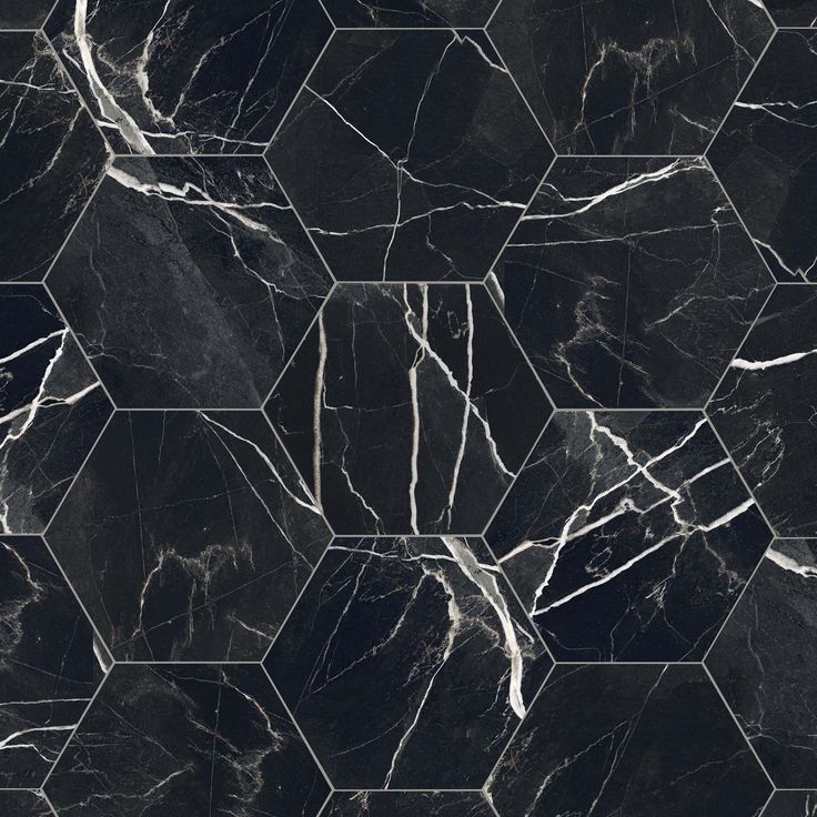 black and white marble tile with hexagonal design in the center, on a dark background