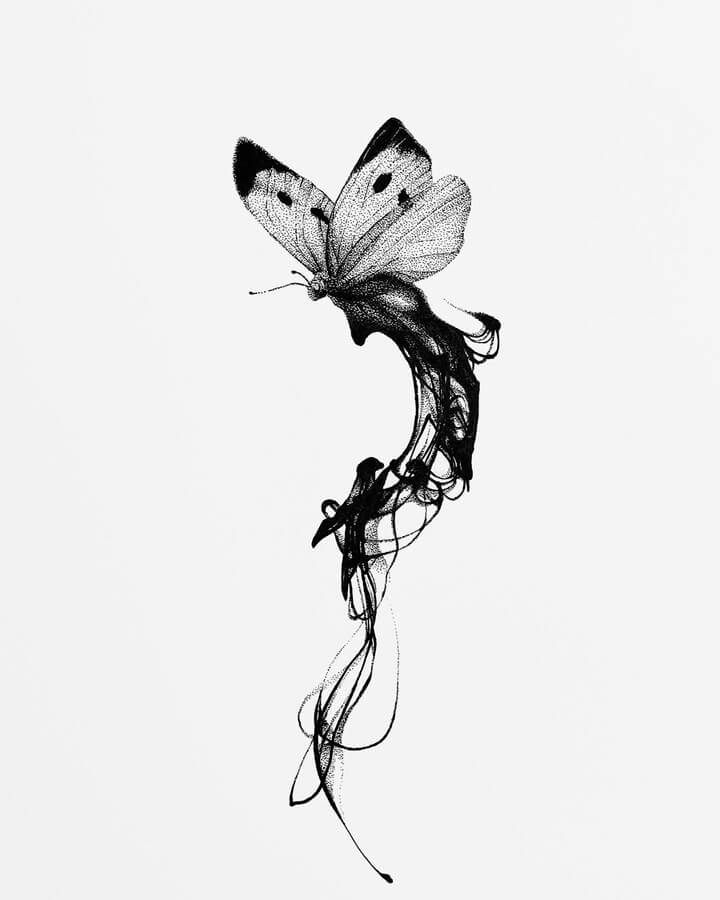 a black and white photo of a butterfly flying in the sky