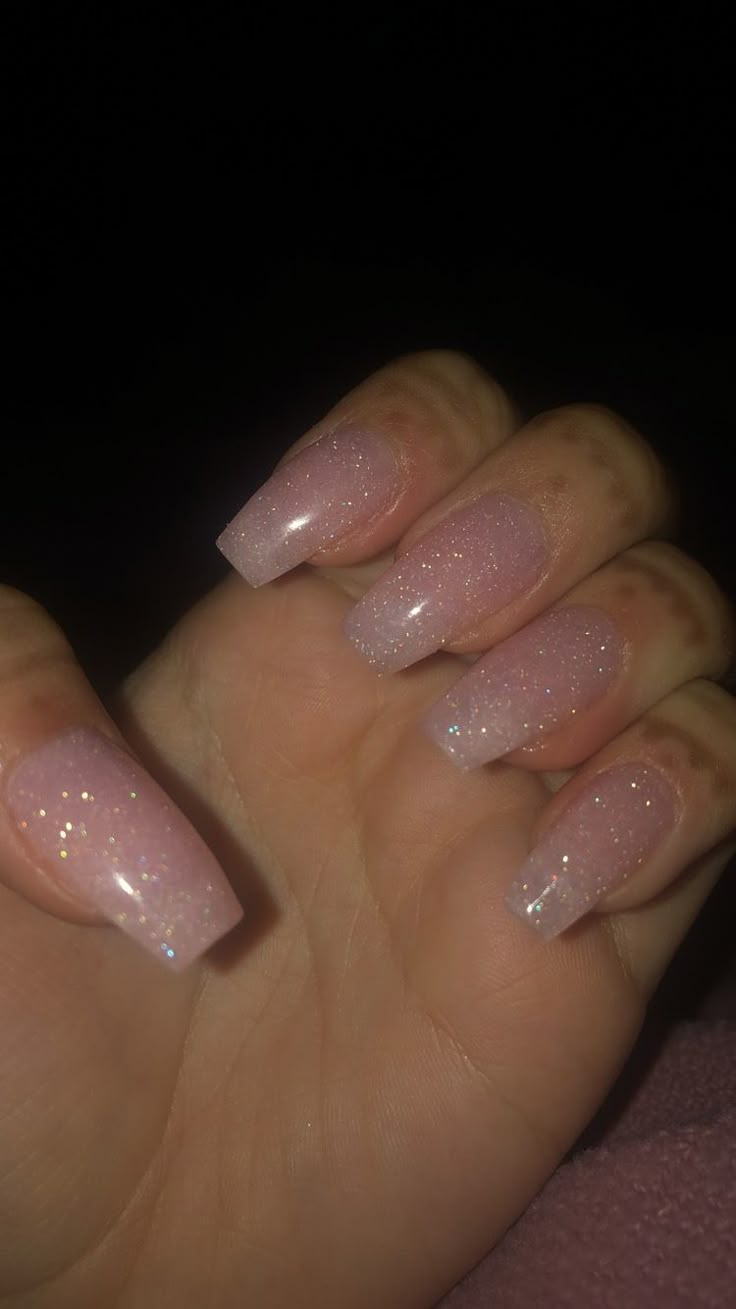 Soft Pink Nails With Glitter Sparkle, Simple Pink Glitter Nails, Natural Acrylic Nails With Glitter, Sparkly Nude Pink Nails, Simple Shiny Nails, Shimmery Nails Acrylic, Light Glitter Pink Nails, Glitter Light Pink Nails, Clear Nails With Sparkles