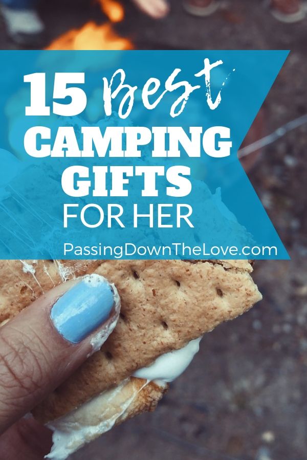 a hand holding a cookie with the words 15 best camping gifts for her