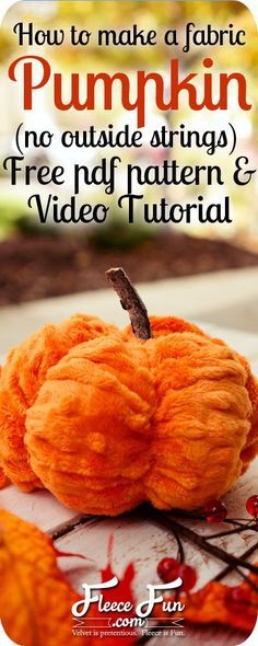 a pumpkin sitting on top of a table next to a sign that says how to make a fabric pumpkin no outside strings