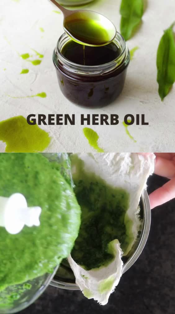 This may contain: green herb oil is being poured into a blender and then blended in a jar