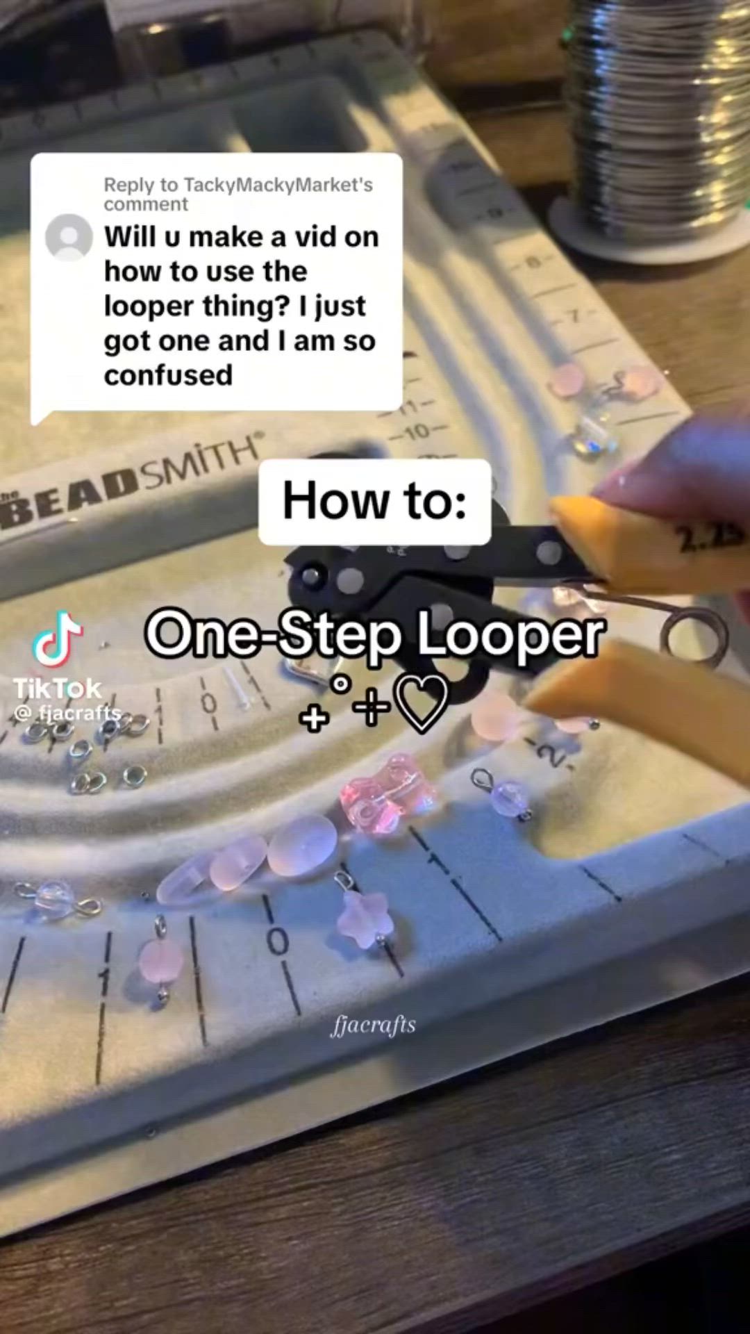 This may contain: someone is using scissors to cut the holes in their jewelry display board with text that reads, how to one - step looper