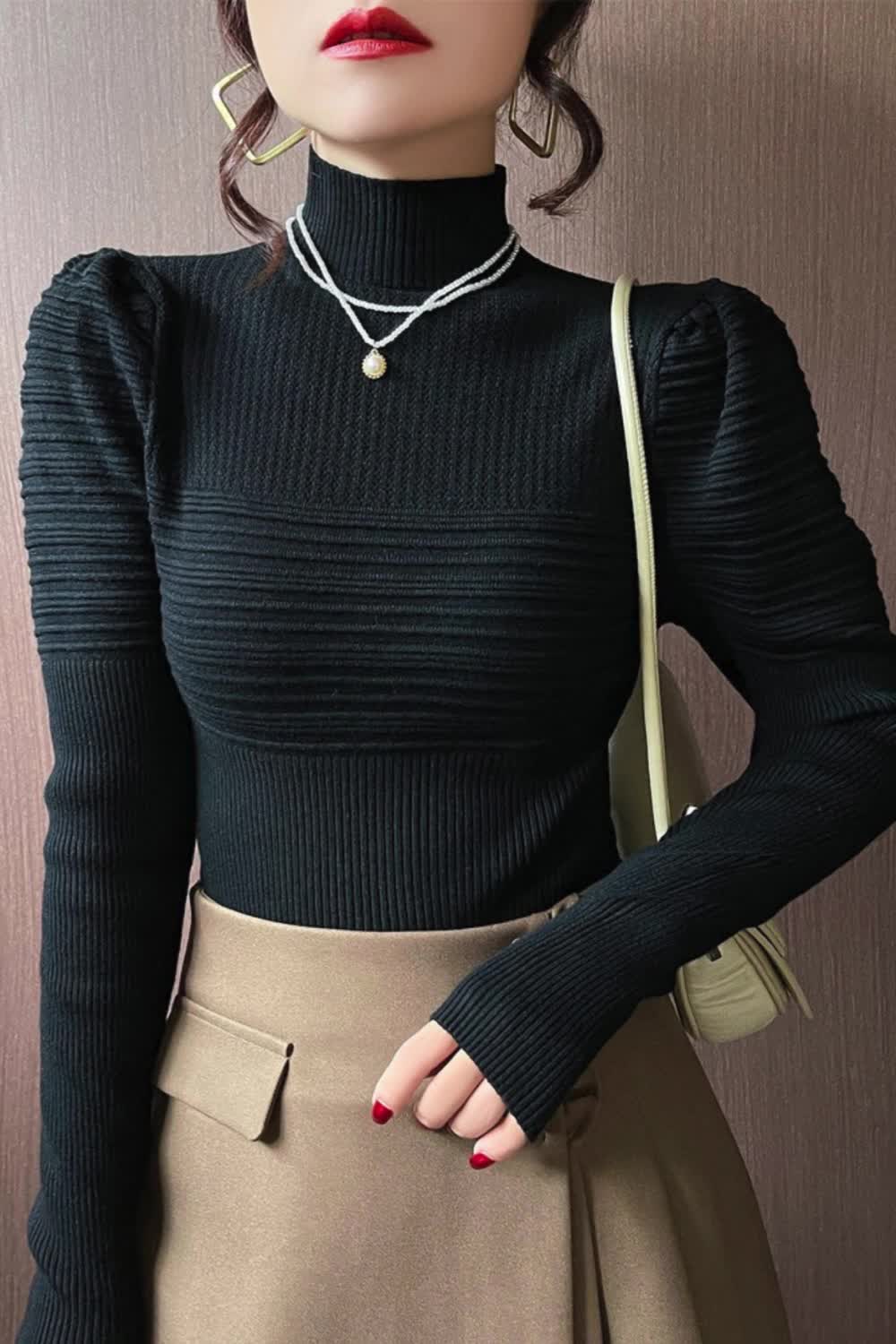 This contains: This elegant solid basic knitted top for women features a turtleneck and puff sleeves, giving it a casual yet chic look. Made from high-quality material, this sweater offers both style and comfort. Perfect for adding a touch of Korean fashion to your wardrobe.