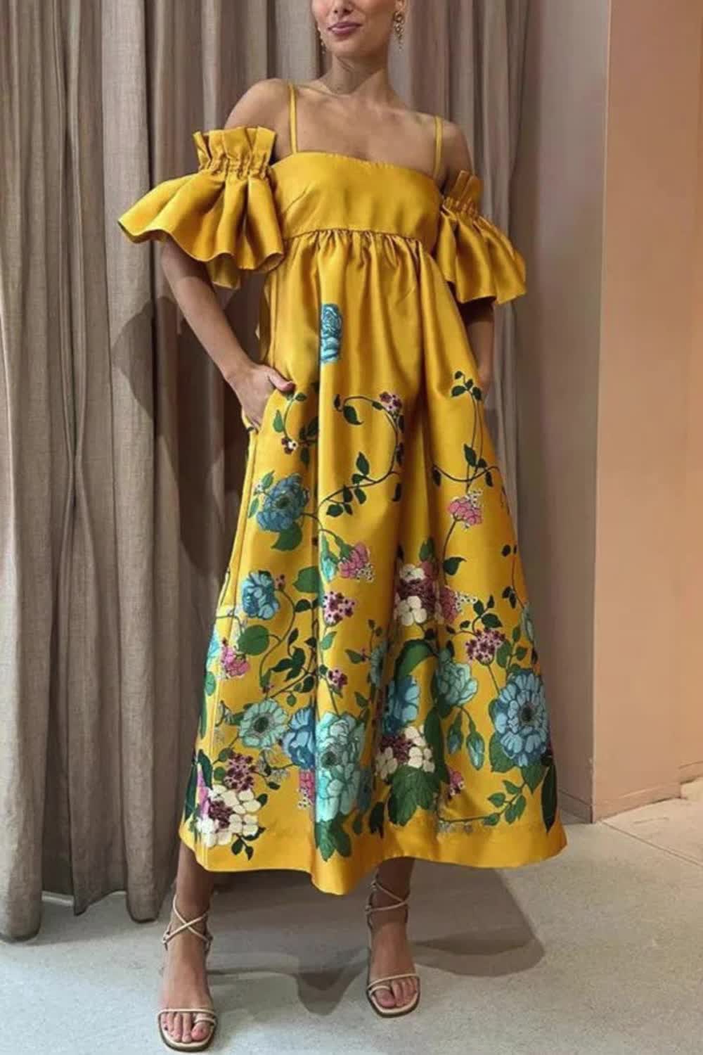 "Indulge in the charm of our 'Sweetest Marigold' midi dress. Adorned with a delightful marigold print, its gathered sleeves and A-line silhouette exude femininity and grace. With the added convenience of pockets, this dress seamlessly combines style and functionality for a look that is both sweet and practical."