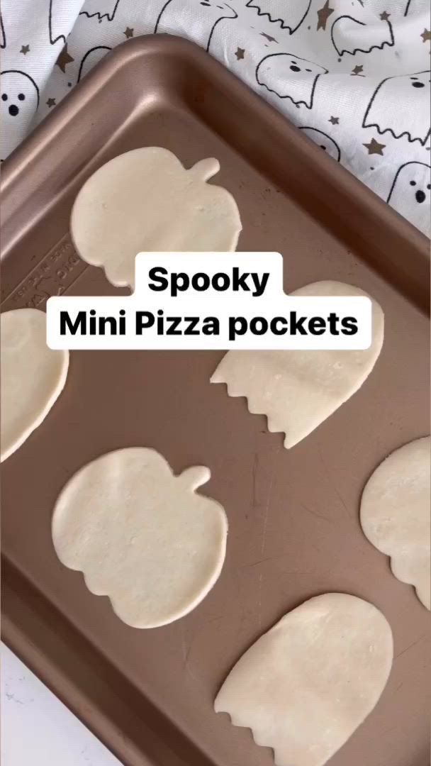 This may contain: an image of mini pizzas in the baking pan