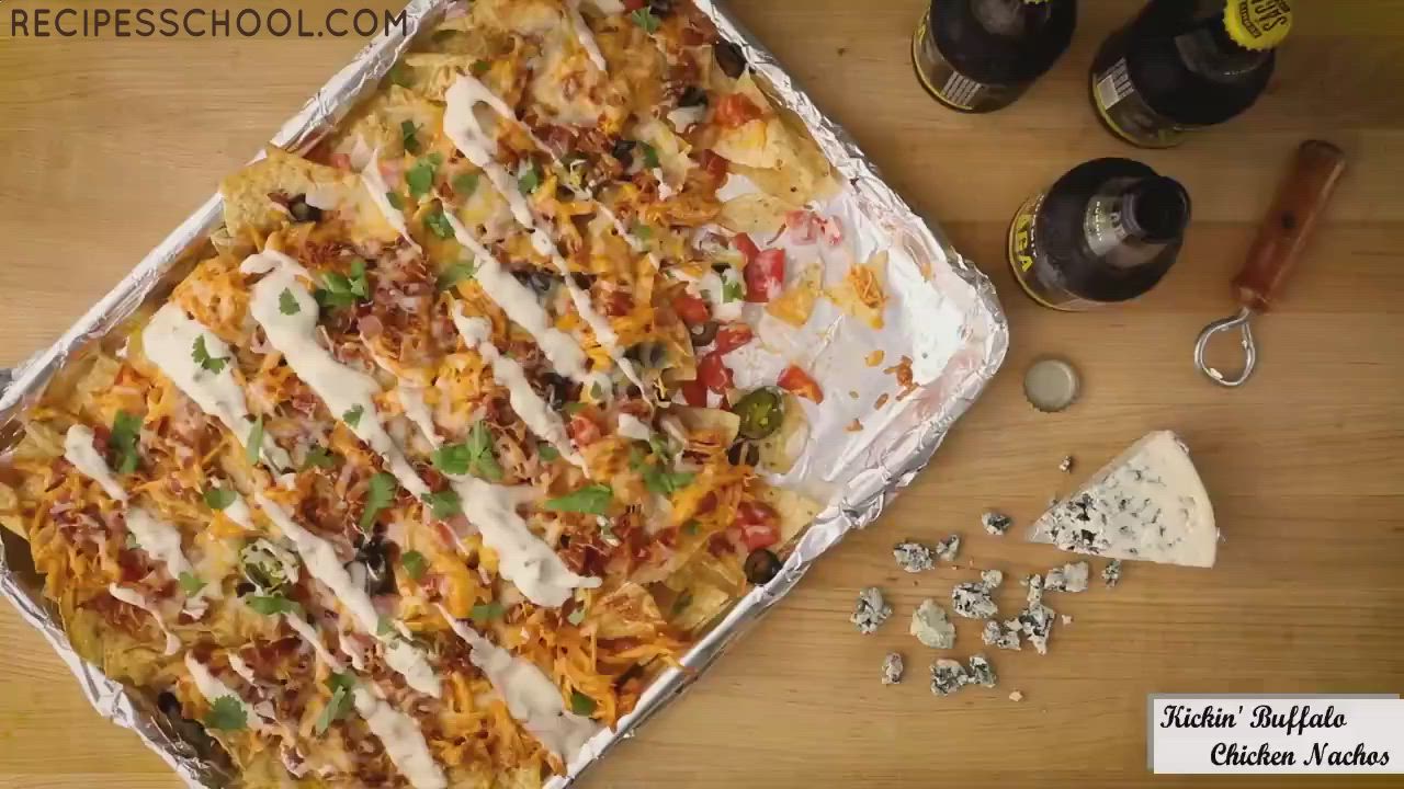 This may contain: chicken nachos with text overlay that reads 1 kickin buffalo chicken nachos