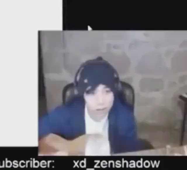 This may contain: a woman sitting at a table with a guitar in front of her and the caption reads, ubscriber xdzenshadow