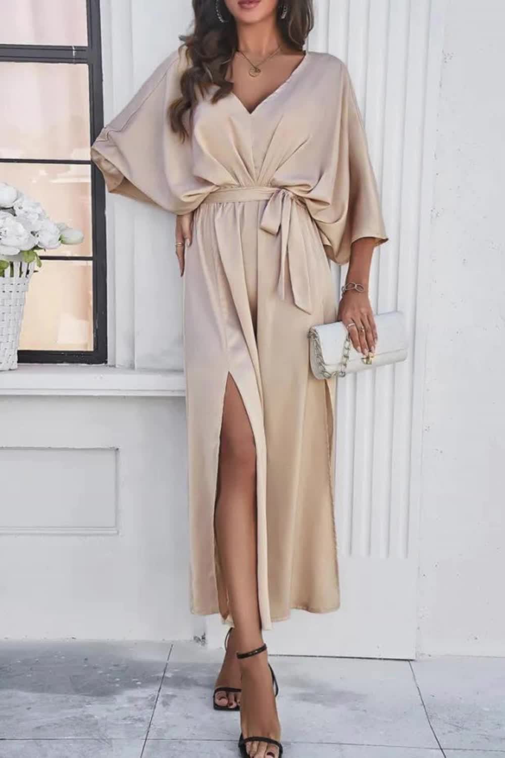 "Elevate your allure with this Women's Sexy V-Neck Split Party Dress. Featuring a daring split design and alluring V-neckline, it exudes captivating charm. Perfect for glamorous occasions, this dress commands attention with its sultry silhouette and effortless sophistication."