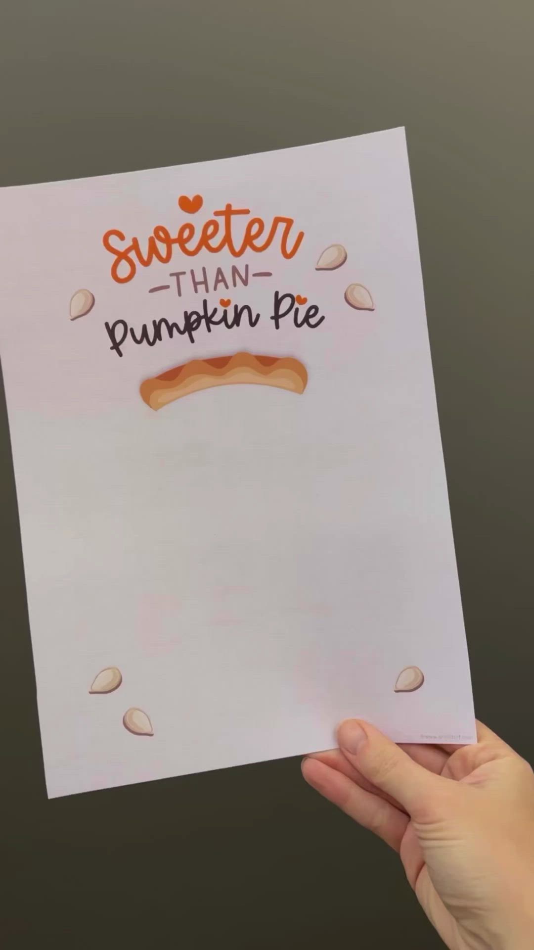 This may contain: someone holding up a piece of paper that says sweeter than pumpkin pie