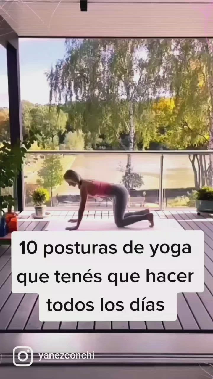 This may contain: a woman is doing yoga on the porch