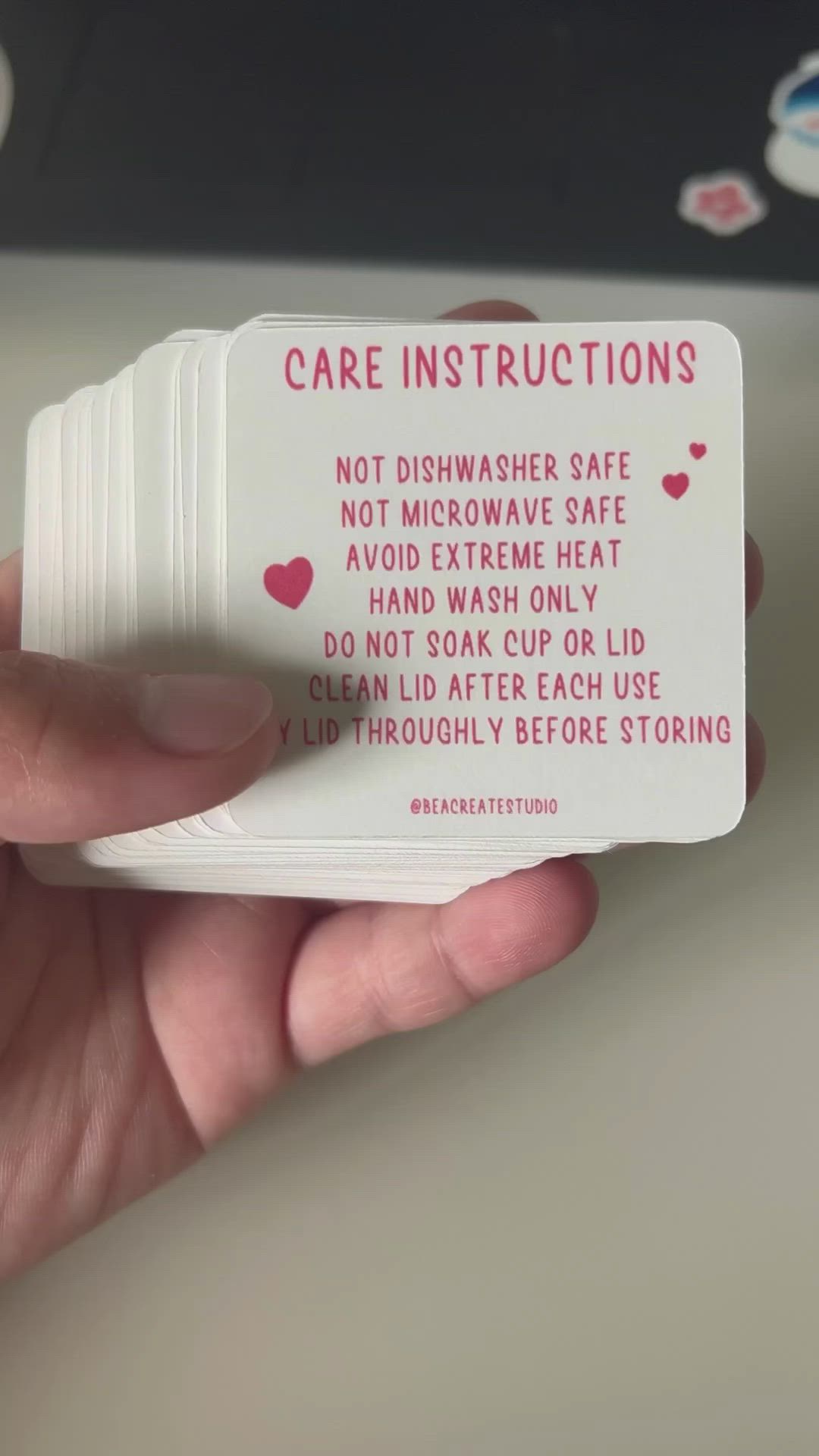 This may contain: someone is holding up a card with instructions on how to make care instructions in it