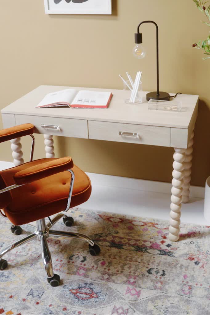 This contemporary desk is highlighted with bubble legs and 2 pull out drawers with acrylic handles. It has the perfect amount of attitude and sweetness to compliment a more feminine space. 2 pull out drawers with acrylic handles Sculptural bubble legs for a modern look Some assembly required, screwdriver needed