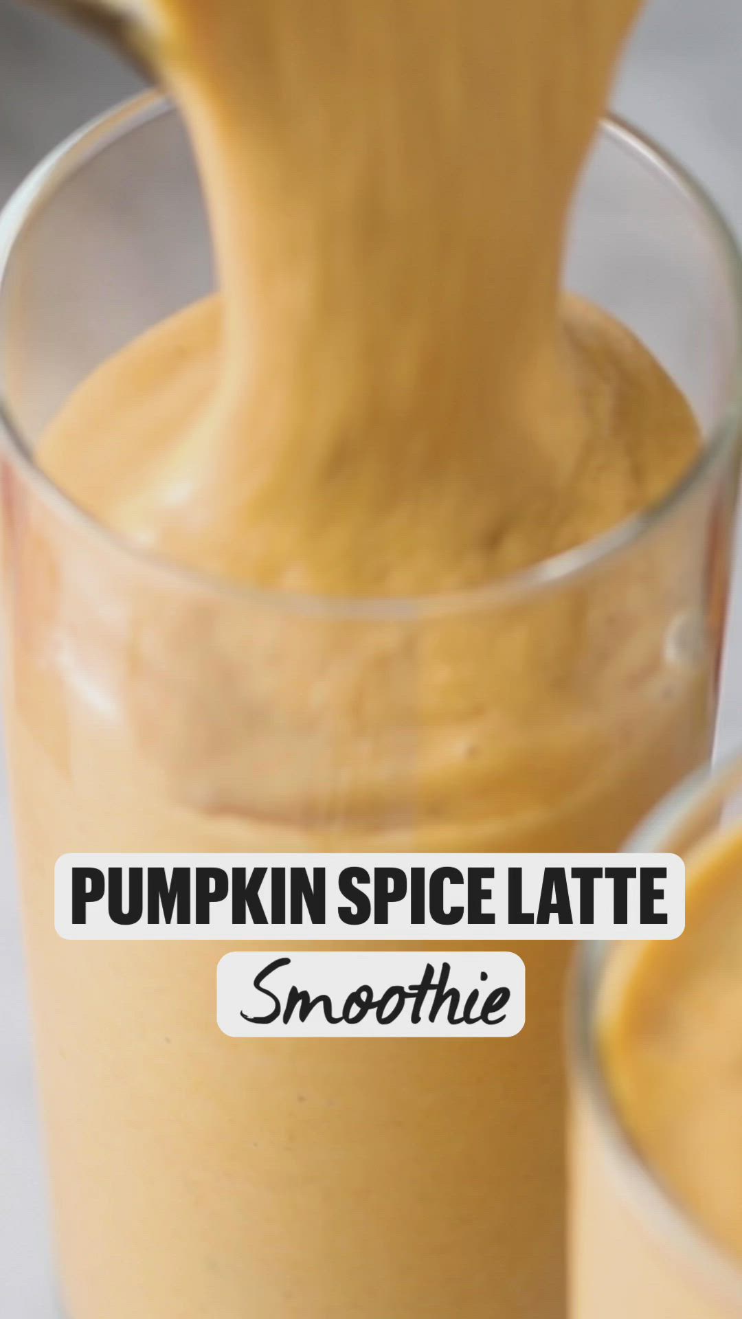 This may contain: pumpkin spice latte smoothie with whipped cream and pecans in the background text reads pumpkin spice latte smoothie