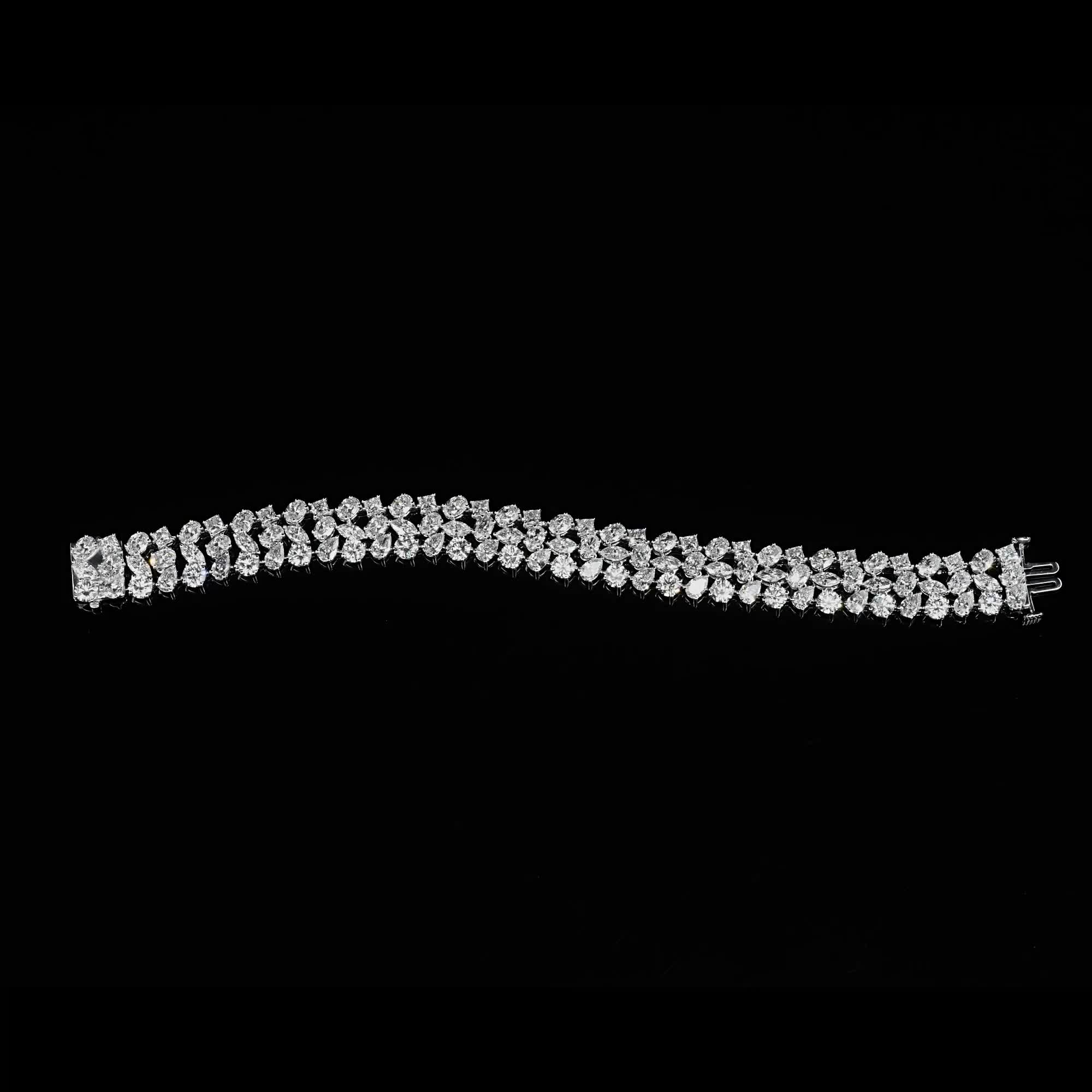 Round, pear, and marquise diamonds merge together for their impeccable fire and scintillation to form a diamond bracelet that effortlessly captivates discerning eyes, making a perfect jewel to mark milestone moments.