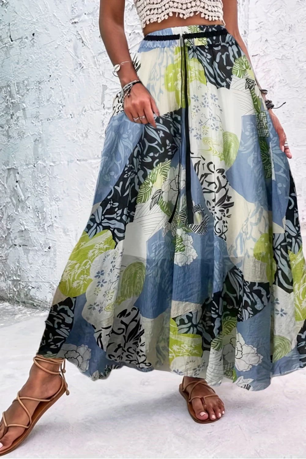 Elevate your summer style with our floral print high waist skirts. Embrace the boho beach vibes in these pleated maxi skirts, perfect for those sunny days. Effortlessly chic and comfortable, these skirts are a must-have for your summer wardrobe.