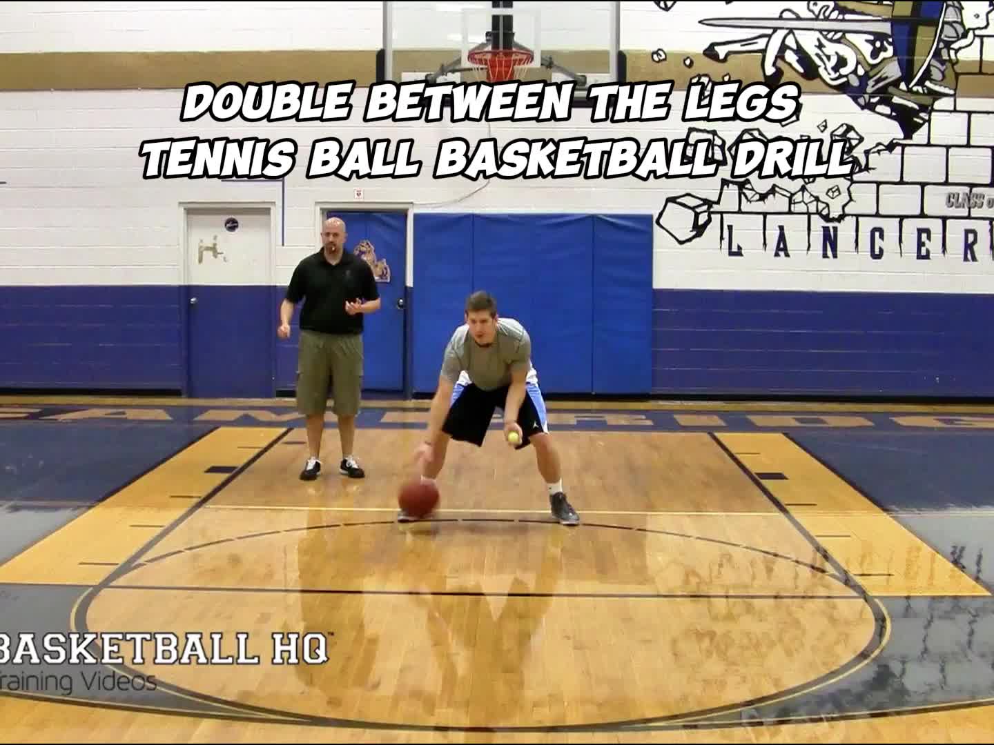 This may contain: two young men playing basketball on a court with the words handle and long written above them