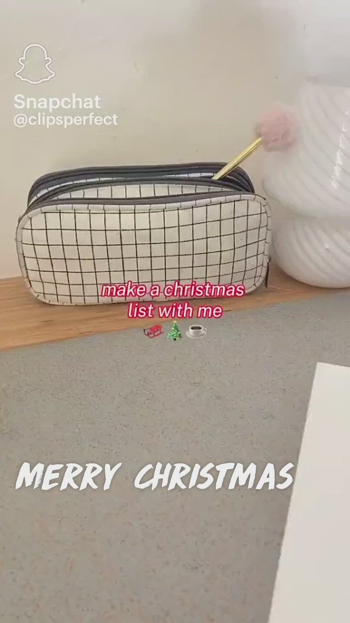 This may contain: a merry christmas message with a basket and toothbrush on the floor next to it