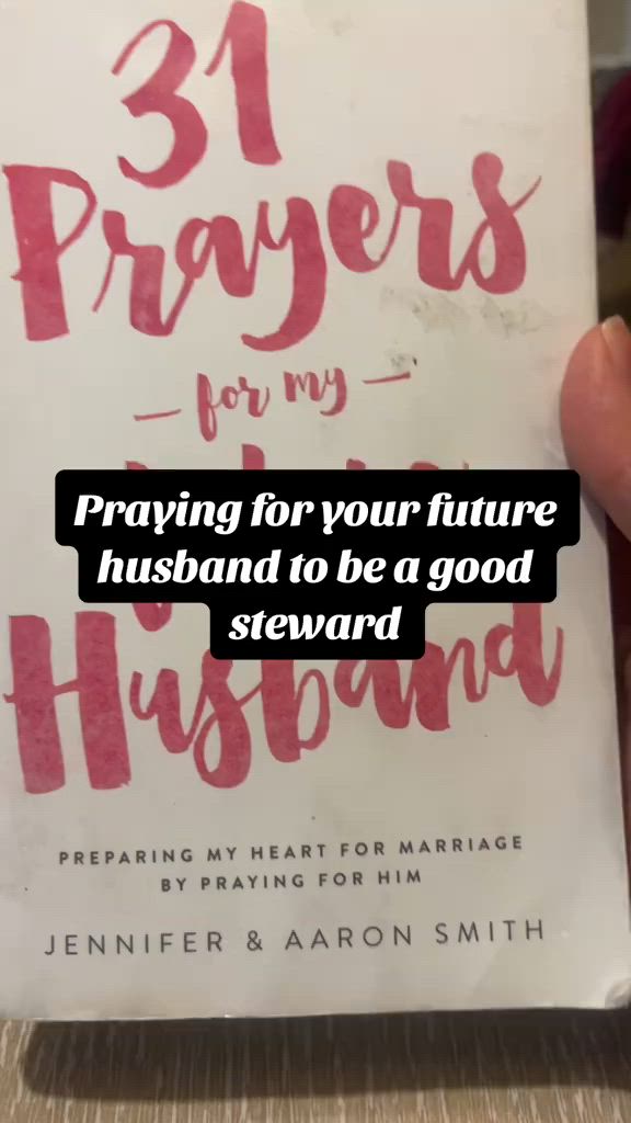 This may contain: a hand holding a book with the title 31 prayer for your future husband to be a good husband