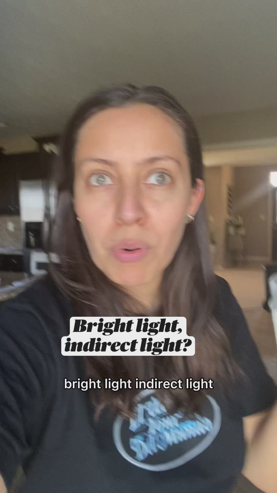 This may contain: a woman is making a funny face with her hand in front of her head and the caption reads, bright light indirect light