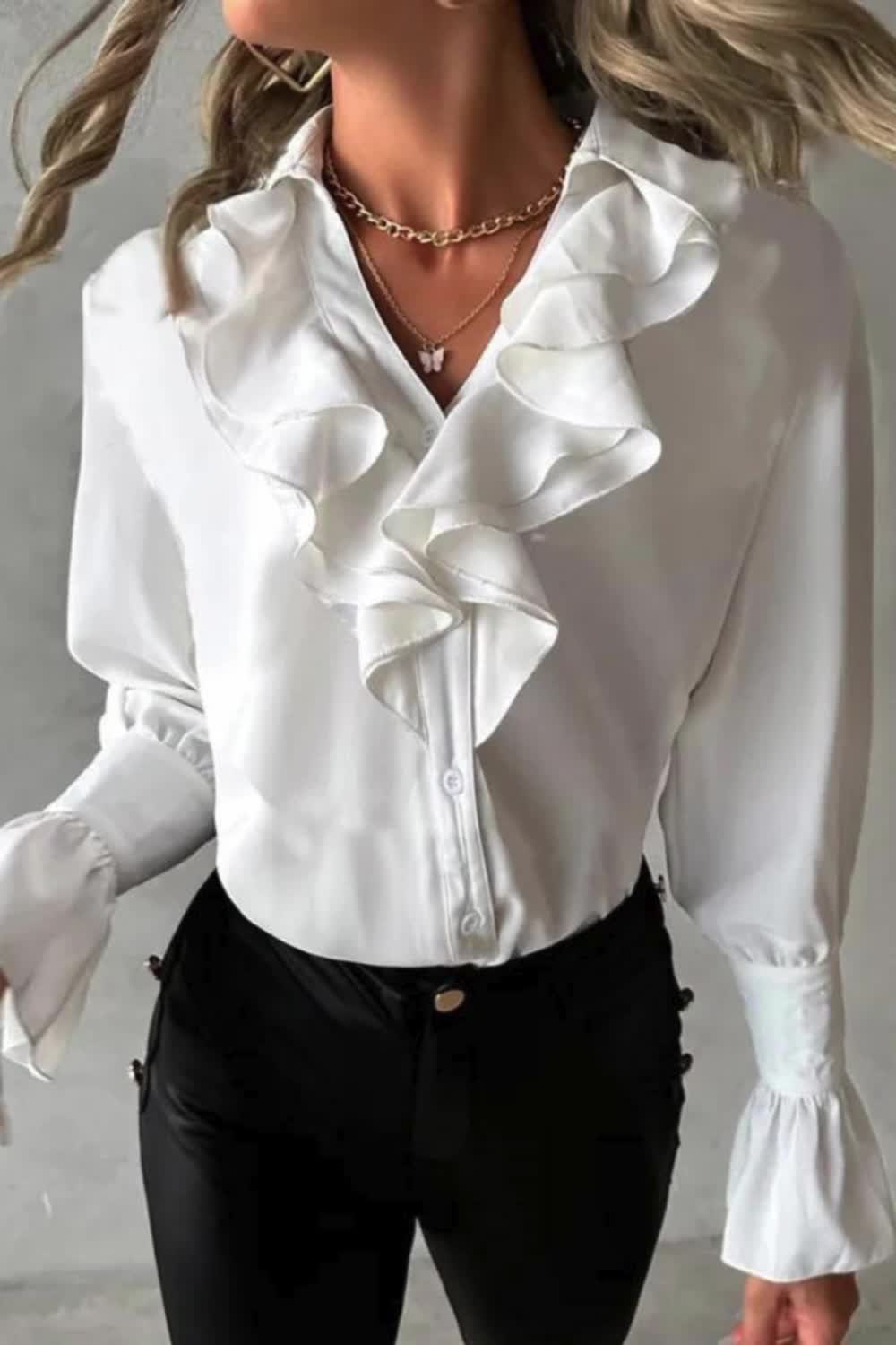 "Upgrade your wardrobe with our Fashion Elegant Long Sleeve Shirt. Featuring a casual turn-down collar and an OL style, this white blouse combines sophistication with versatility. Perfect for office wear or a chic, everyday look."