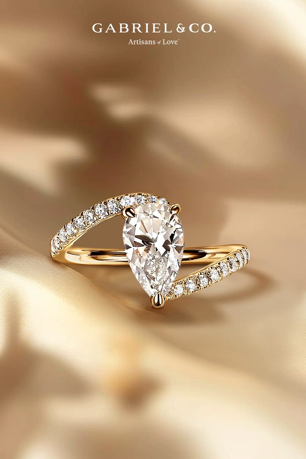 This contains: Leina - 14K Yellow Gold Pear Shape Halo Diamond Engagement Ring
ER16320P6Y44JJ