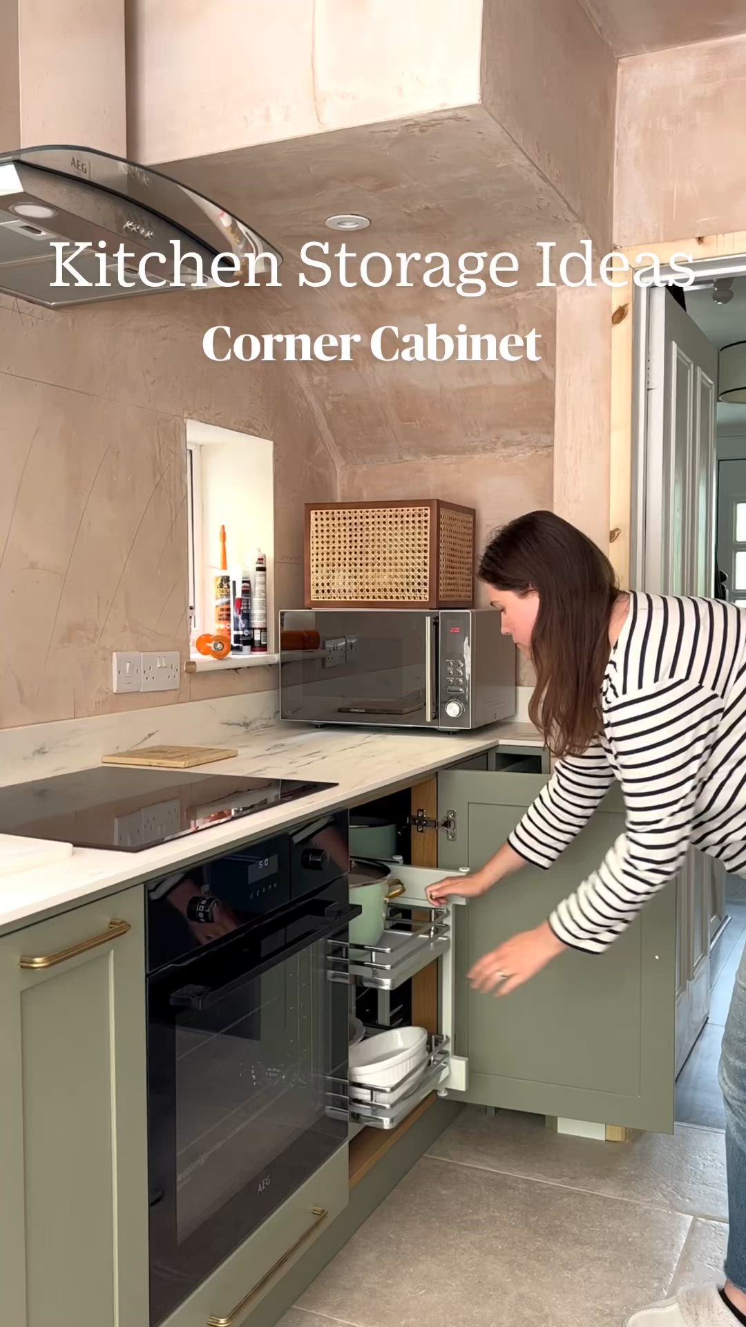 This may contain: the kitchen storage ideas corner cabinet is open