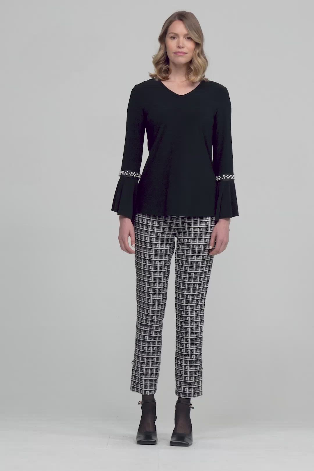 Joseph Ribkoff Style 213021 Color: Black Composition: 96% Polyester, 4% Spandex Description: No pockets; No zipper; Not lined; Fitted; Long Sleeve; Solid Approximate length (size 12): 27" - 69 cm