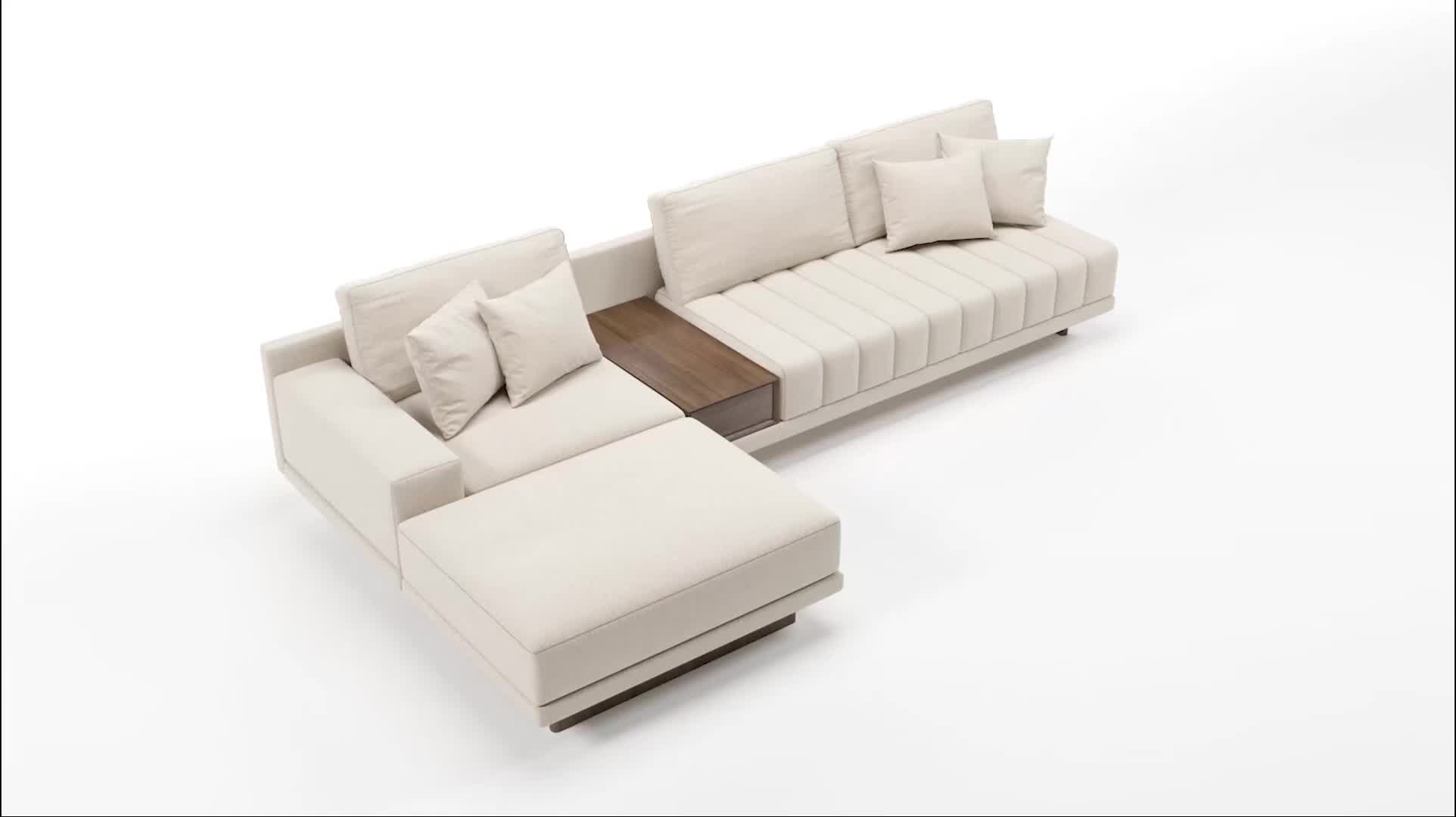 This may contain: a white sectional sofa with pillows on it