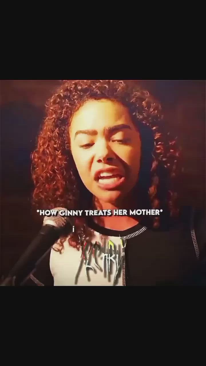 This may contain: a woman singing into a microphone with the words now only treats her mother