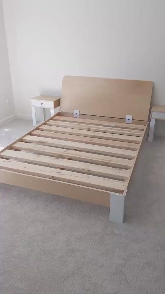 This may contain: the bed frame is made up and ready for us to use