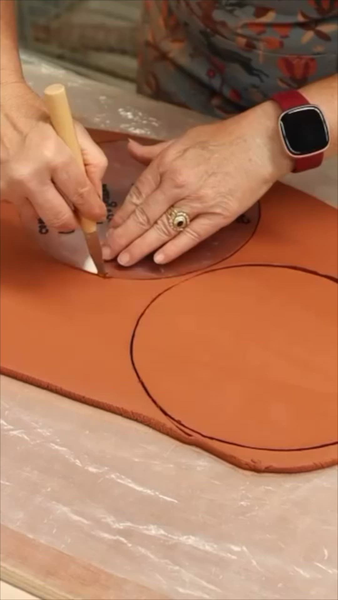 This may contain: a woman is working on an object with the words secret revealed