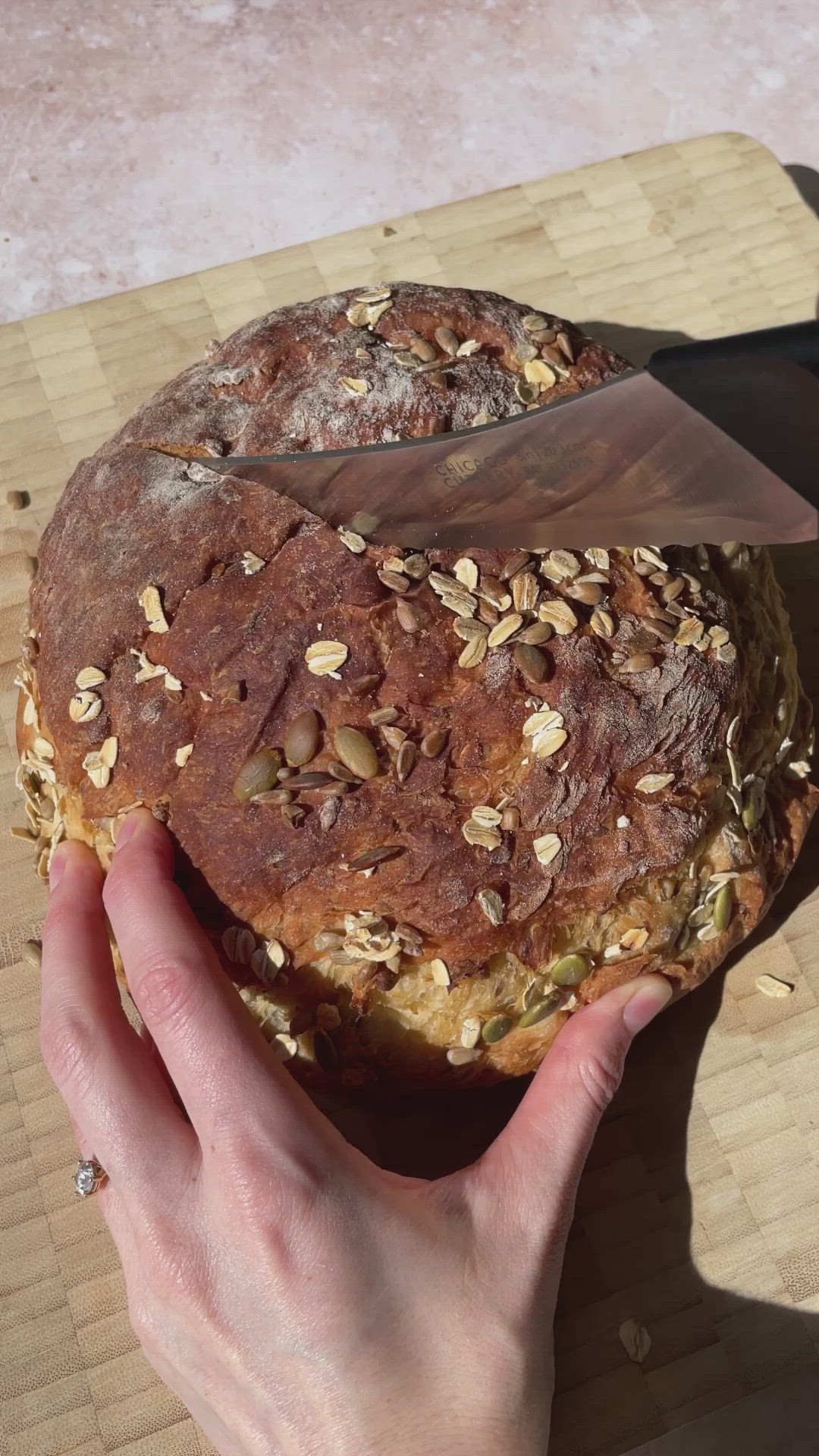 This contains: video of No Knead Seeded Honey Oat Artisan Bread being made