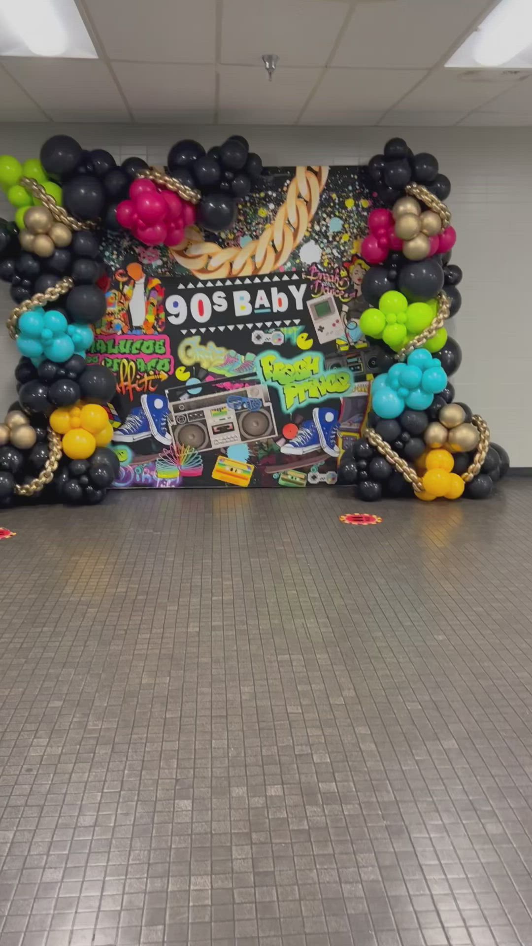 This may contain: the entrance to an office decorated with balloons