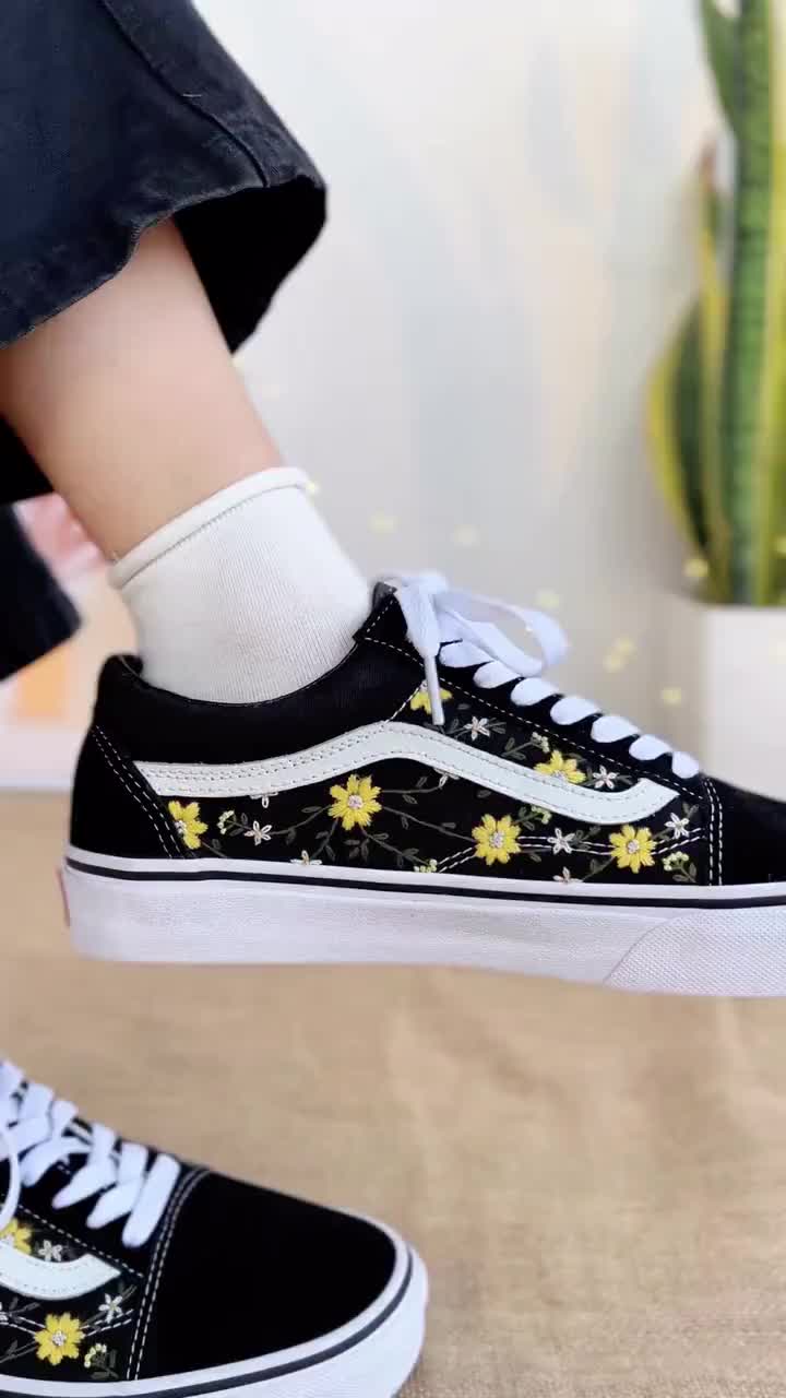 This contains: Embroidered Vans