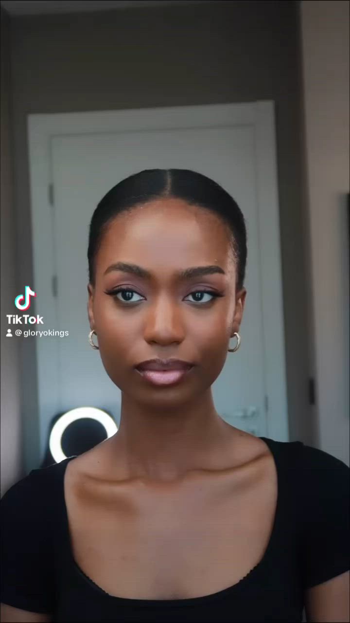 This contains: Natural hairstyle, 4c hairstyle, 4c natural hairstyle, 4c low bun, clean girl aesthetic, clean girl hairstyle, black women hairstyle.