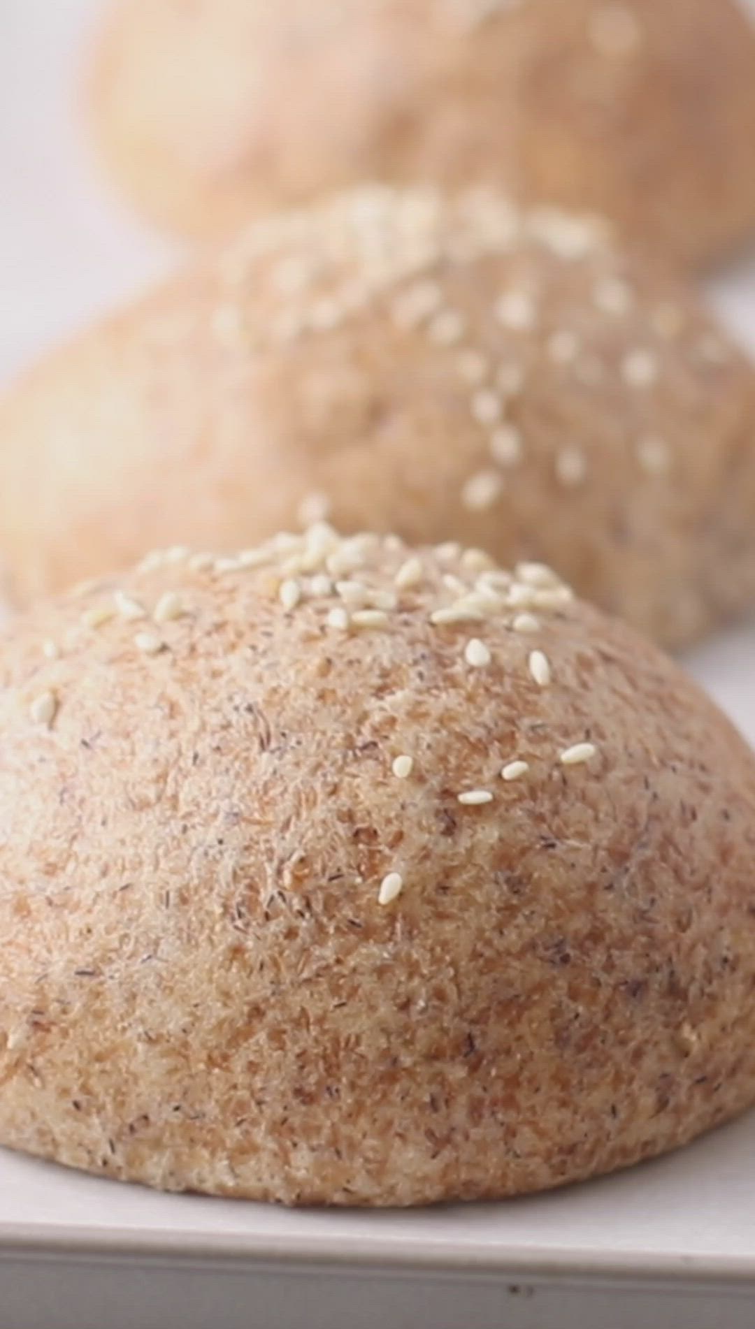 This may contain: keto almond flour bread on parchment paper