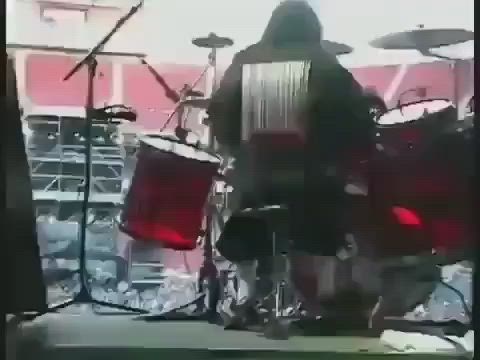 This may contain: a man is playing drums on stage