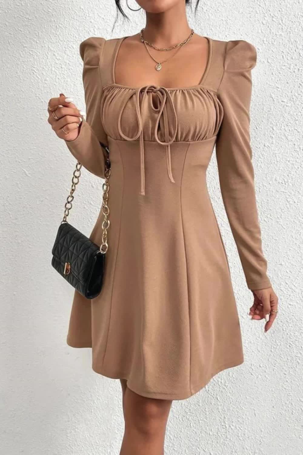 "Elevate your casual chic with our Women's Camel Color Casual Square Collar Puff Sleeve Dress. This stylish piece features a trendy square collar and puff sleeves, adding a touch of sophistication to your look. Perfect for daytime outings or casual gatherings, it offers both comfort and style."