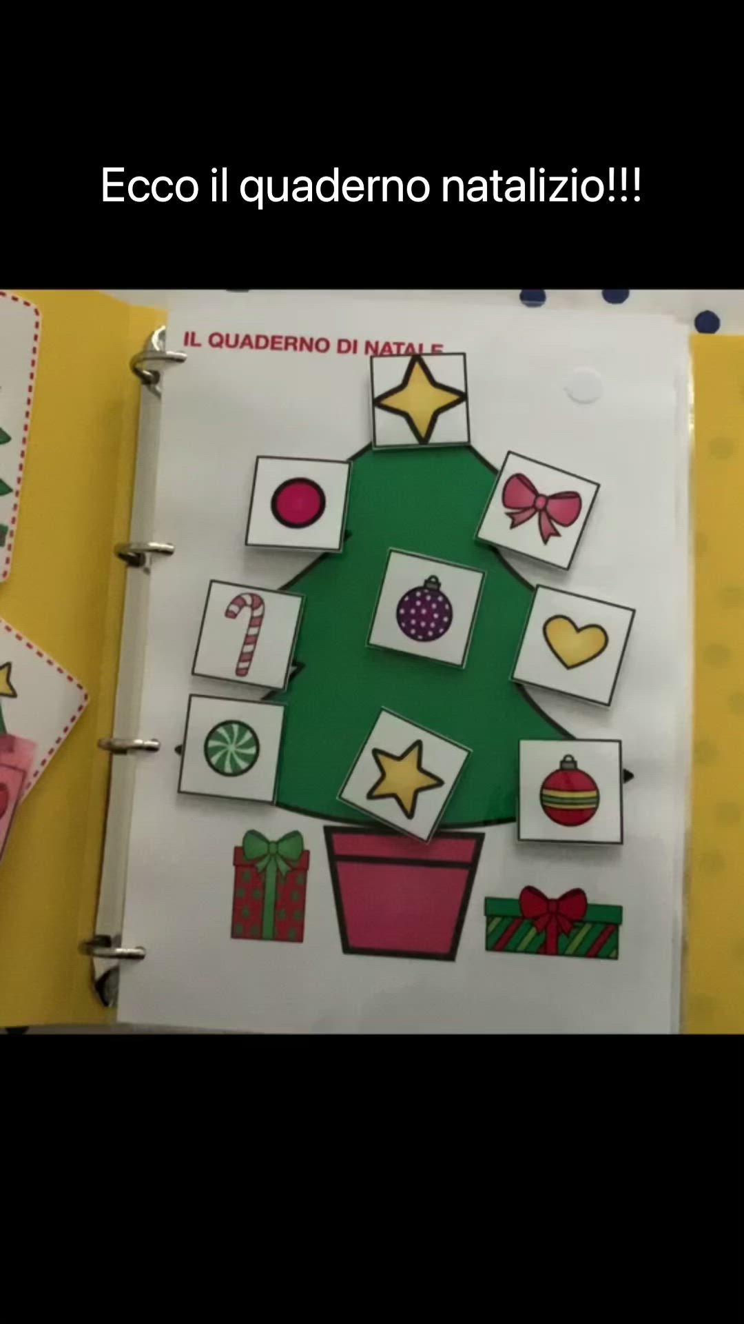 This may contain: a christmas tree made out of cut outs on a page in a spanish language book